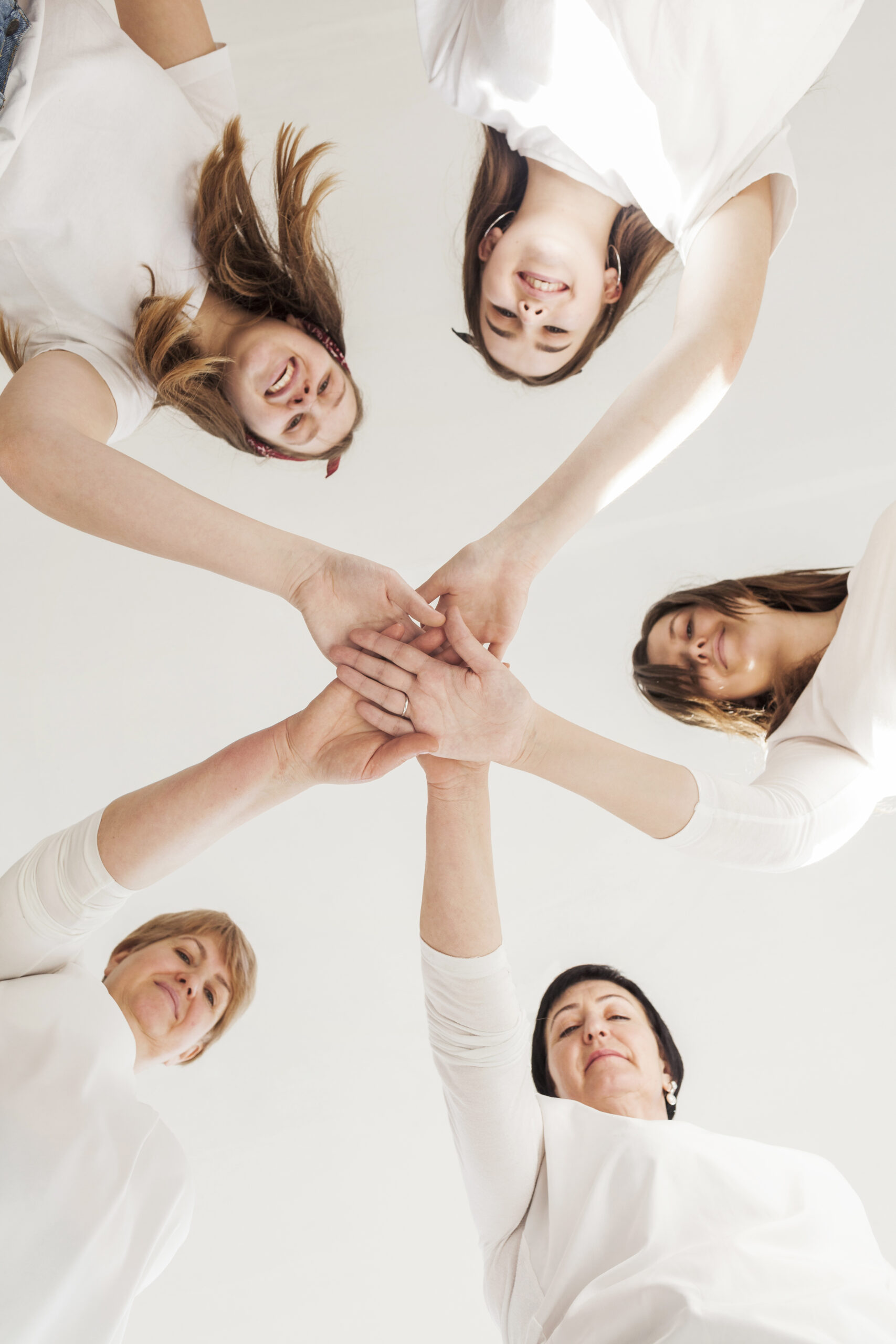 togetherness-group-women-touching-hands